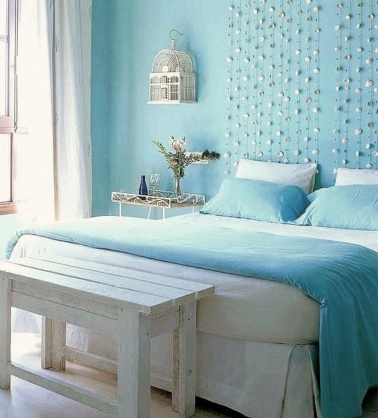 Blue Bedroom with Seashell Garland over Bed