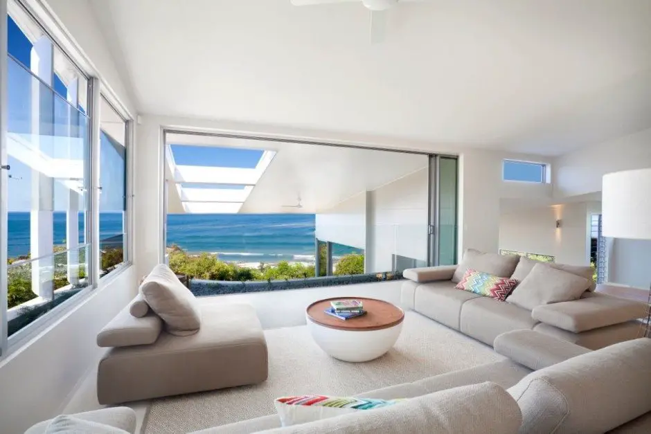 http://ontrus.com/wp-content/uploads/2014/09/cool-beach-house-with-modern-interior-design-ideas-also-cream-sectional-sofa-and-round-coffee-table-as-well-as-glazed-window-plus-sea-view.jpeg