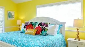 Beach Cottage With Bright Blue Yellow Lime Green Painted